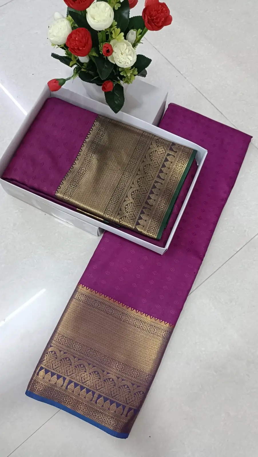 Magenta Pink Soft Silk Saree with Day-Night Turning Border and 3D Embossing